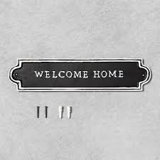 In a blog post published on monday, target announced how they will display hearth & hand with magnolia in about 500 of their stores across the country. Welcome Home Wall Sign Black White Hearth Hand With Magnolia Target