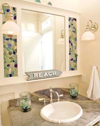 The light blue hue of the carrara marble floor and shower may make you feel as if you are showering in the ocean. 15 Beach Bathroom Ideas Coastal Decor Ideas Interior Design Diy Shopping