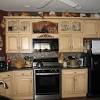 Dreamy cream kitchen features lovely green island country. 1