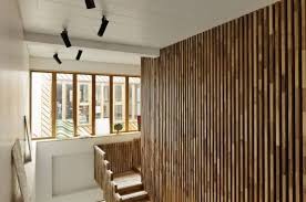 Wooden slat walls are becoming more in vogue all the time as well as more attractive. Vertical Wood Slat Wall Wood Slat Wall Slat Wall Eclectic Interior Design