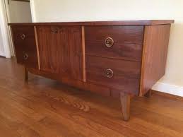 The tag inside says it is walnut. Circa 1962 Lane Cedar Chest With Drawers Epoch