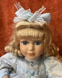 Collector's Choice 11” Porcelain Doll. Blond Ringlet Curls. Wind up Doll,  Plays the ABC Song and Moves Her Head. Vintage Musical Moving Doll