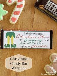 Turn a simple candy bar into a festive gift or stocking stuffer with these free printable christmas candy bar wrappers! Elf Inspired Printable Christmas Candy Bar Wrapper Bombshell Bling