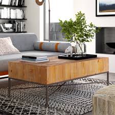 There will always be reclaimed and rustic wood coffee tables… there's just something about the warmth of wood that makes you wanna touch it and have it nearby like in the living room as a coffee table…or something. Williston Forge Carly Reclaimed Wood Coffee Table Wayfair