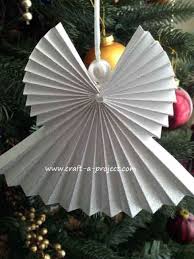 Papirdiszek A Karacsonyfara Szines Otletek Christmas Angel Crafts Paper Christmas Decorations Paper Christmas Ornaments