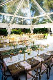 Peach And Gold Backyard Wedding Clear Top Tent Rustic Wood Tables Backyard Wedding Reception Tent Backyard Wedding Wedding Backyard Reception