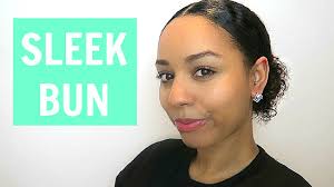 Hairstyles for curly frizzy hair. Sleek Middle Parting Bun Tutorial For Curly Hair Youtube