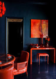 The Furniture In This Room Makes The Space Feel Asymmetrical Its Placement Is Balanced However And Makes A Li Dining Room Design Red Dining Room Home Decor