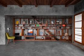 I love how they make a space feel like a cozy library. Ingenious Bookshelf Designs In Surprising Spots