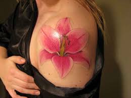The particular lily will be baby pink within color along with stripes down the middle of each petal. 32 Unusual Lily Tattoos Designs