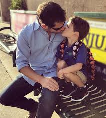 He kisses his father and tom says 'that was just a peck.' john returns and kisses his father on the mouth for a few seconds, before wiping his mouth and turning the conversation back to football. Celebrity Dads Kissing Their Children On The Mouth The Frisky