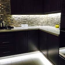 Under Cabinet And Footwell Led Strip Lighting Also Hidden Counter Top Receptacles Kitchen Under Cabinet Lighting Kitchen Led Lighting Strip Lighting Kitchen