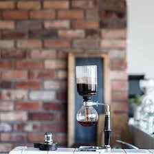 Lighting The Burner And Making A Stunning Hario Syphon Coffee Shop Syphon Alternativebrewing Link In Bio Light Roast Coffee Buy Coffee Beans Coffee Roasting