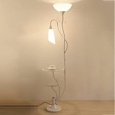 If your decor skews darker or you generally love industrial chic, the carlisle floor lamp may be up your alley. Floor Light Lamp Floor Lamps Warm Light Low Profile Multi Functional Home Floor Lamp 2 Glass Shelves 2 White Acrylic Lampshade Living Room Bedroom Floor Lamp H164cm Standing Lights Lamps Buy Online At Best