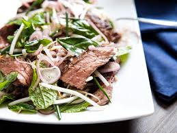 The flat iron steak is best known for packing a beefy punch. Thai Style Marinated Flank Steak And Herb Salad Recipe