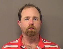 Man charged with shooting brother at local motel