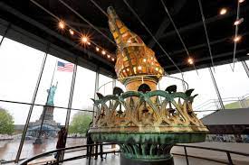 The flame of the new torch is covered in gold leaf. Photos Inside The New Statue Of Liberty Museum The Boston Globe