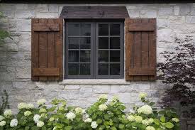 Cedar Shutters Exterior Traditional With Black Clad Windows Hand Hewn Shutters Stone Shutters Exterior House Shutters Windows Exterior