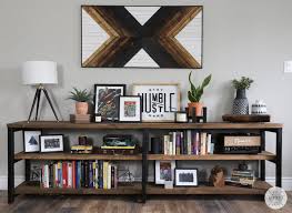 With the shelves in place, add finish nails through the outside of the unit to hold the shelves in place (image 3). Diy Metal Wood Bookshelf Diy Huntress