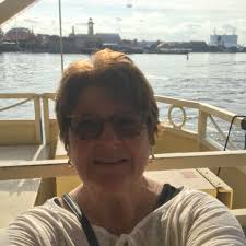 How to lighten the look of a dark colored leather sofa and power recliner?