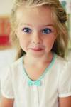 Newborn Baby Girl With Blonde Hair And Blue Eyes