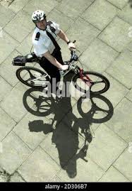 PC Steve Keown with the part carbon fibre, Smith and Wesson bike that West  Midlands Police are trialing in the centre of Coventry. the Police are  hoping for sponsorship for the crime