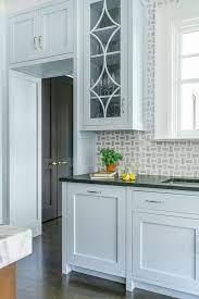 Mix things up when it comes to all of the finishes in your kitchen, from the. Light Blue Kitchen Cabinets With Black Granite Countertops Transitional Kitchen
