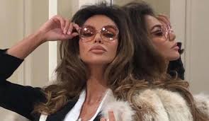 The smoked glasses, the tanned skin, the proud smile and the soft fur, which cannot be whiter. Madalina Ghenea Gucci Sophia Loren Lascimmiapensa Com