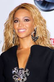 The parted design gives her a unique hairstyle that befits her skimming long hair. 80 Best Beyonce Hairstyles Of All Time Beyonce S Evolving Hair Looks