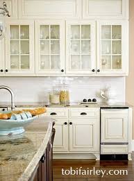 Traditional And Elegant Kitchen Design By Tobi Fairley Antique White Kitchen Cabinets Antique White Kitchen New Kitchen Cabinets