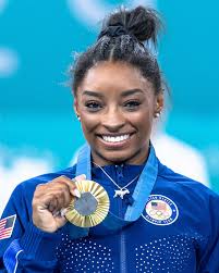 Jordan Chiles Flashes Diamond Grill With Her Olympic Gold Medal