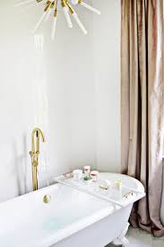 Caddies are made with an extra 1/4 inch to give a comfortable fit. Lucite Bathtub Caddy Diy A Beautiful Mess