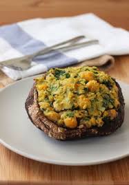 When buying portabellas, make sure to pick ones that will sit flat on the pan and have high edges. Chickpea And Spinach Stuffed Portobello Mushrooms Recipe Fake Food Free Portobello Mushroom Recipes Mushroom Recipes Recipes