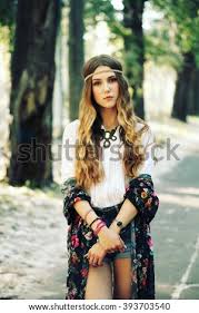 Fashion portrait stylish brunette woman in boho style,. Shutterstock Puzzlepix