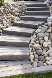 Due To Its Individual Look And Colour Stability Natural Stone Is The First Choice For Many Ama Garden Stairs Backyard Landscaping Backyard Landscaping Designs