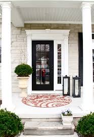 The Yellow Cape Cod How To Create A Low Maintenance High Style Entrance Front Porch Decorating Front Door Design House With Porch
