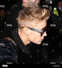 Justin Bieber is surrounded by fan as he celebrates his 19th birthday with  his rumoured girlfriend Ella-Paige Roberts Clarke and Stock Photo