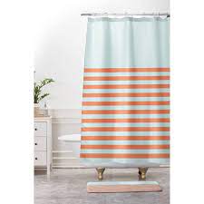 Abracadabra—a stylish new shower curtain can transform the look of a bathroom in the wink of an eye! June Journal Beach Striped Shower Curtain Blue Orange Deny Designs Target