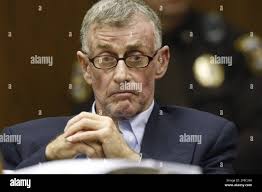 Michael Peterson partecipa alla sua audizione al Durham County Courthouse  di Durham, Carolina del Nord, martedì 13 dicembre 2011. Tom Bevel, un  esperto riconosciuto a livello nazionale e autore del libro di