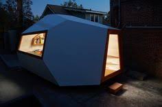Knowhow Shop Designed The Geometric Lighthouse To House Their Studio Casas Prefabricadas De Diseno Disenos De Casas Arquitectura
