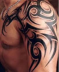 A simple tattoo gets its point across without all the bells and whistles. Tribal Tattoos With Shading