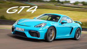 I'll have a red one. New Porsche 718 Cayman Gt4 Track Review Carfection 4k Youtube