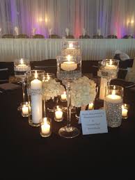 Candle Centerpiece Black And Silver Wedding Lots Of Candles Rhinestone Wrapped Vase Silver Wedding Decorations Wedding Centerpieces Diy Candle Wedding Decor
