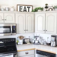 Such a cute way to draw your eye upward and. Diy Above Cabinet Decor Novocom Top