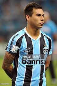 He has two siblings, a brother camilo vargas and a sister baithiare vargas. Eduardo Vargas Of Gremio Poses For A Photo During A Match Between Gremio And Fluminense As Part Of The Copa Bridgestone Libertadores Eduardo Vargas Match Poses
