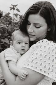 Family Sunflower Portraits At Wickham Farms In Penfield NY