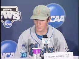 Trevor bauer sits on a folding chair in a drafty warehouse, sipping applesauce from a plastic cup and electrocuting his brain. Ucla Florida College World Series Youtube