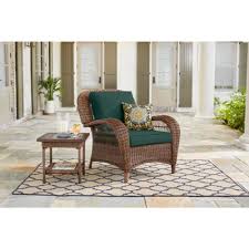 Hampton Bay Beacon Park Brown Wicker Outdoor Patio Stationary Lounge Chair With Cushionguard Charleston Blue Green Cushions H015 01203900 The Home Depot In 2020 Lounge Chair Outdoor Patio Furniture Collection Patio Lounge Chairs