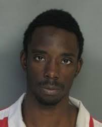 Murder suspect's wife arrested for sneaking contraband