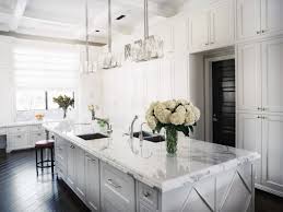 This example has two kitchen islands, one of which is used mainly for dining. Ready To Assemble Kitchen Cabinets Hgtv Pictures Ideas White Modern Kitchen White Kitchen Traditional Classic White Kitchen
